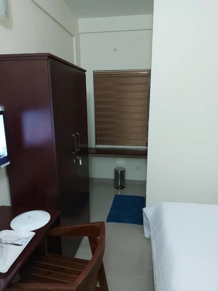 Masterkey Deluxe Rooms Kochi Exterior foto